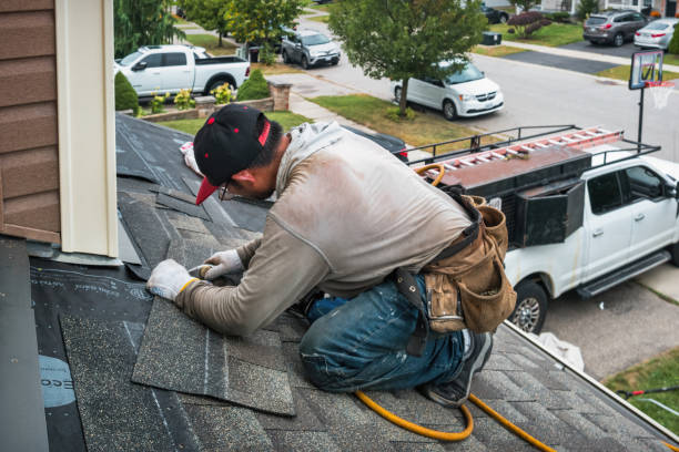 Professional Roof Repair technician working in East Helena, MT